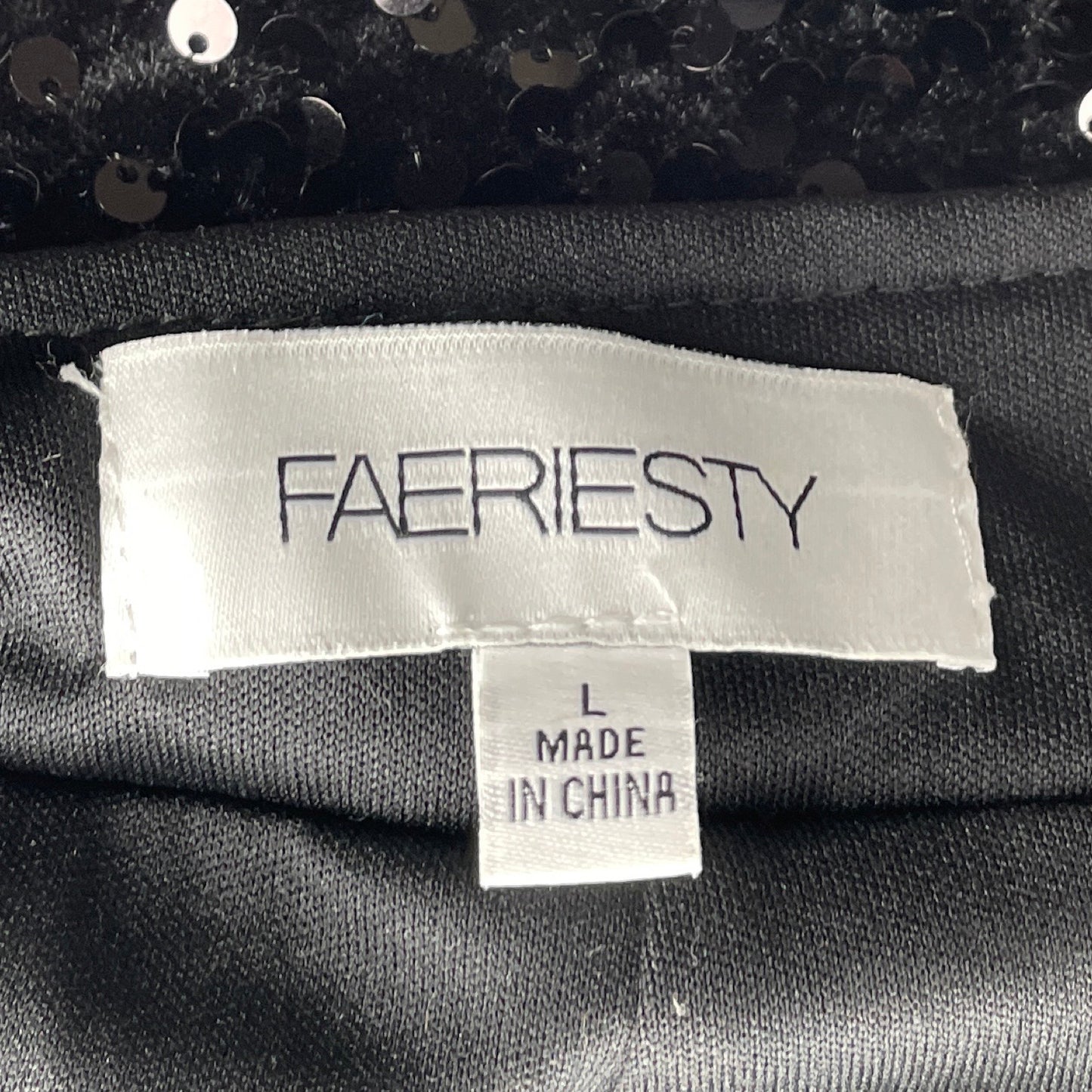 Pantalón FAERIESTY Ancho Lentejuelas Negro-
Talla L