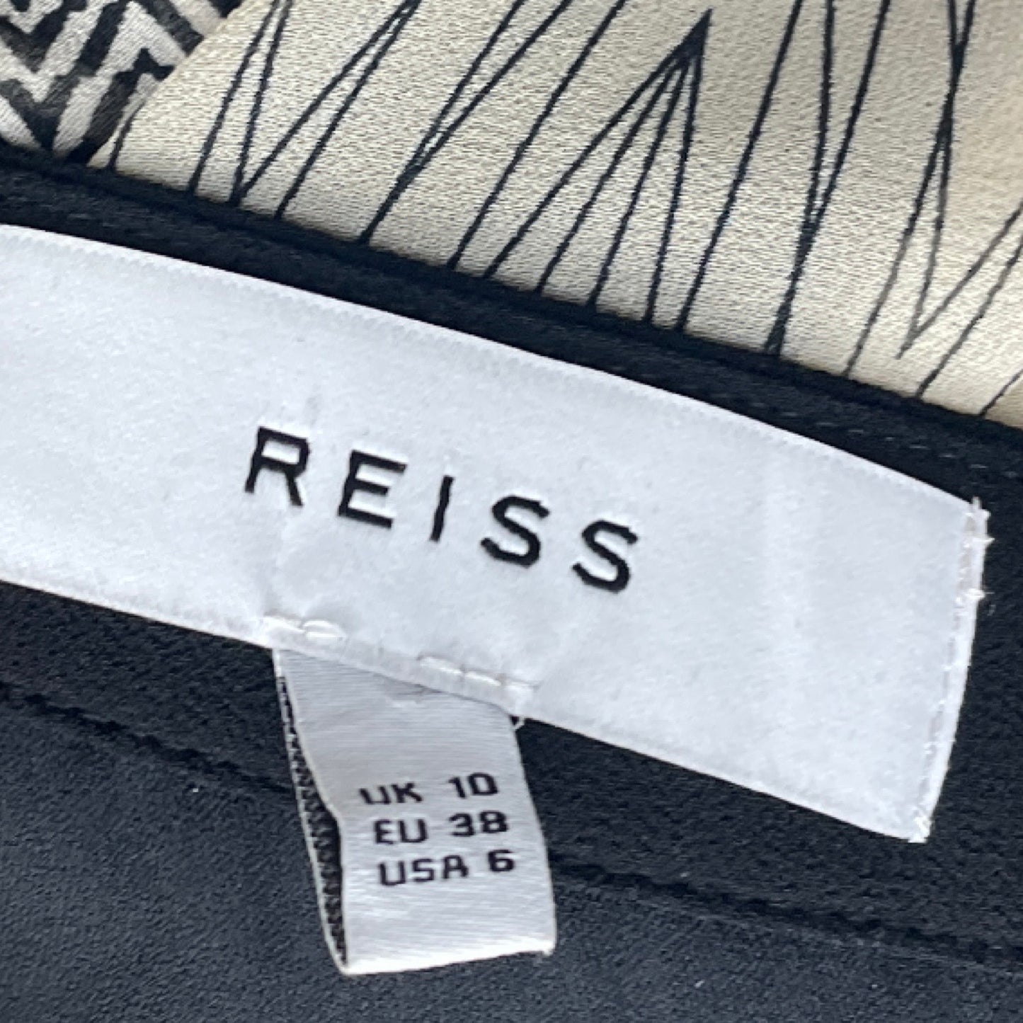 Falda Reiss Mini Estampado Vuelos Negro - Talla 6