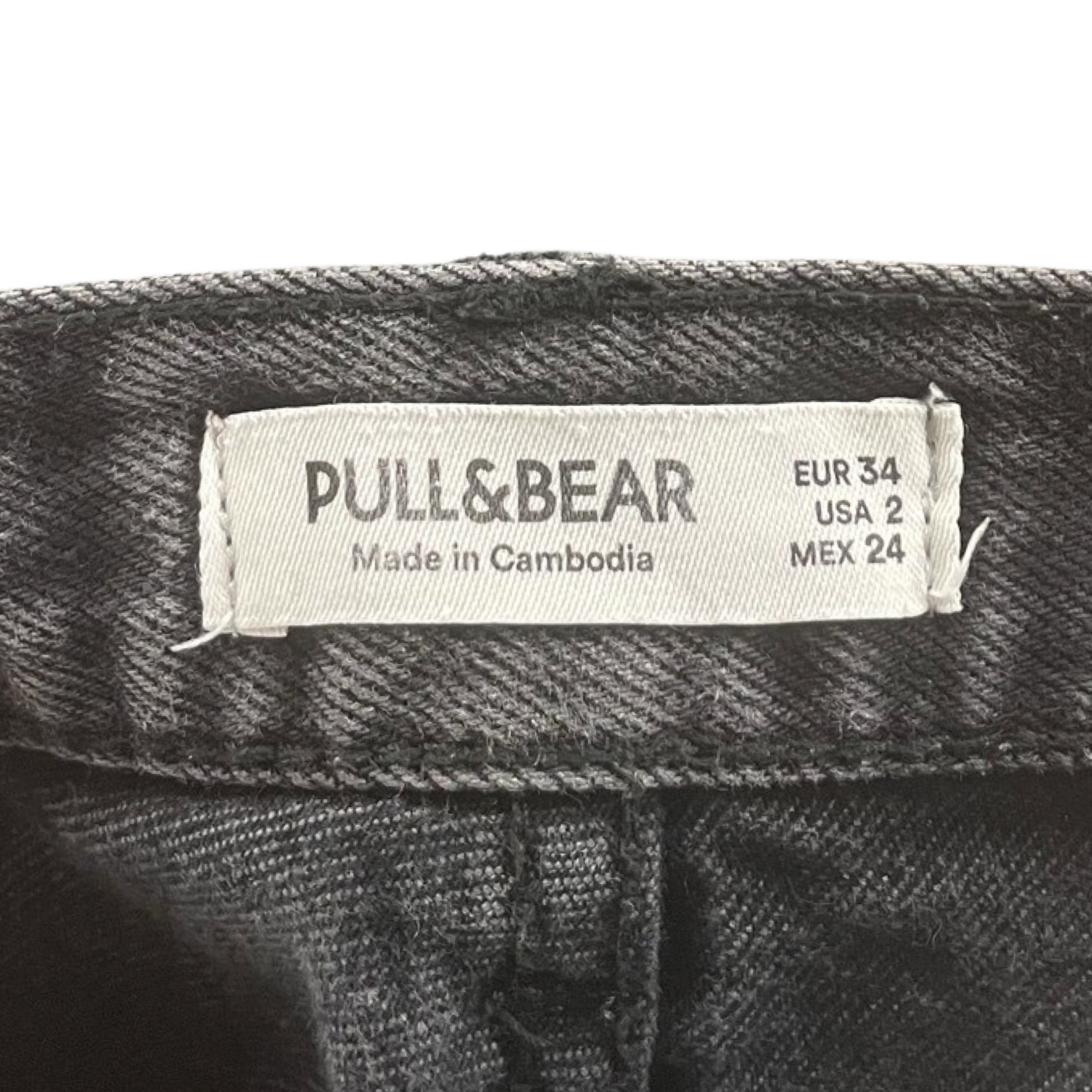 Pantalon negro discount pull and bear