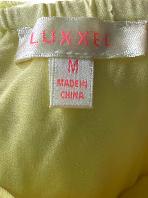 Romper Luxxel Troquelado Tejido Amarillo - Talla M