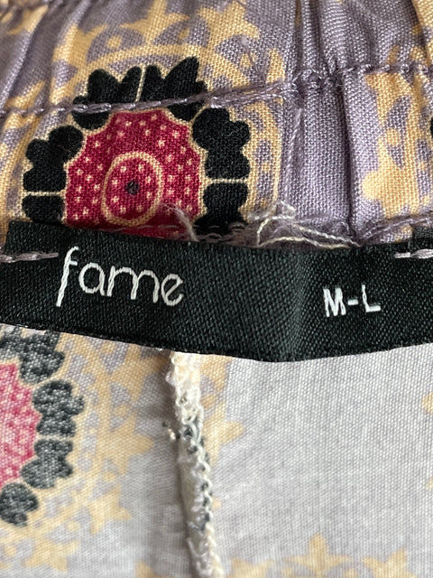 Conjunto Fame de Viscosa Estampado Floral Morado - Talla M